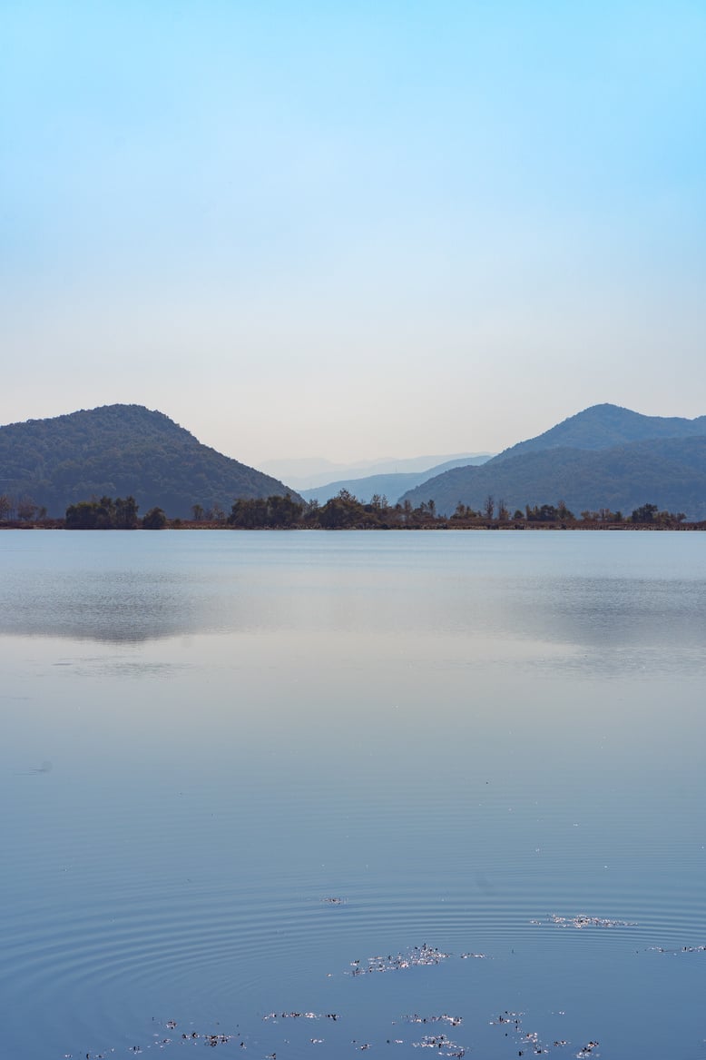 Lake with Mountains in Background